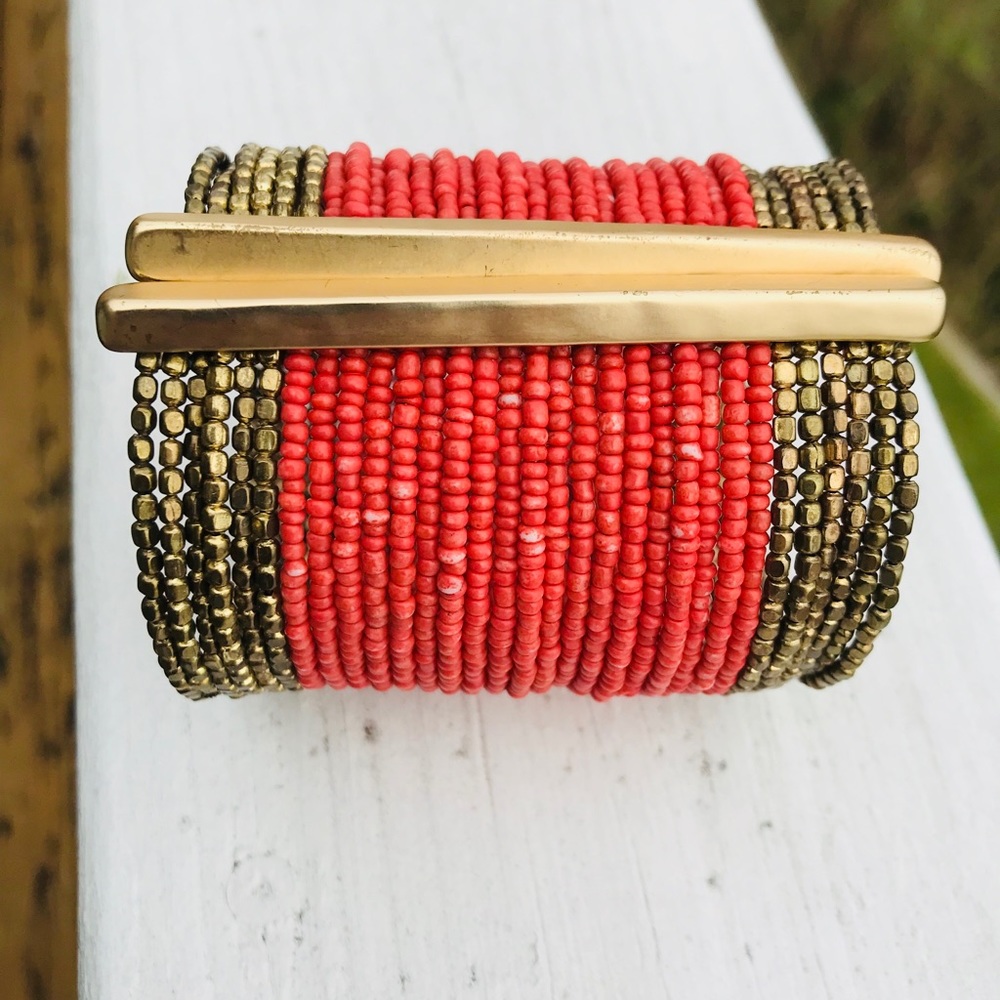 Cuff bracelet, red beads and gold colored accents